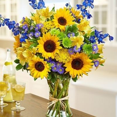 <div class="summary entry-summary">
<div class="woocommerce-product-details__short-description">

Send some sunshine with this bouquet full of fresh sunflowers, delphinium, alstroemeria, yarrow, monte casino and more!
<ul>
 	<li>Our florists hand-design each arrangement, so colors, varieties and containers may vary due to local availability</li>
</ul>
</div>
</div>