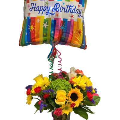 Send cheer and best wishes with the Bright & Beautiful Birthday Arrangement. Bold colors, the freshest blooms and a joyful balloon combine to create a festive feel for their special day. Handpicked happiness delivered.
<ul>
 	<li>Our florists hand-design each arrangement, so colors, varieties and containers may vary due to local availability</li>
</ul>