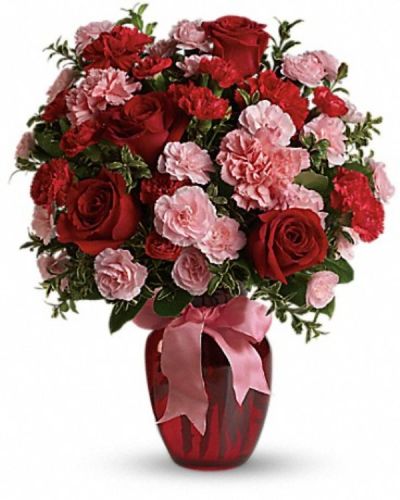 <div class="m-pdp-tabs-description">
<div id="mark-2" class="m-pdp-tabs-marketing-description">True romance will bloom brighter than ever when you surprise her with this dazzling bouquet of red roses, red carnations and other favorites in a chic ruby red vase. "Surprise" is the key word. That's when flowers mean the most.</div>
</div>
This gorgeous bouquet includes red roses, red carnations, light pink carnations, red miniature carnations, light pink miniature carnations and green rhamnus accented with assorted greenery and a pink satin ribbon.
<ul>
 	<li>Our florists hand-design each arrangement, so colors, varieties and container may vary due to local availability</li>
</ul>