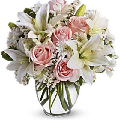 <div id="mark-3" class="m-pdp-tabs-marketing-description">Express your love with the eloquence of Shakespeare - without saying a word. She'll adore this exquisite bouquet of roses and lilies and other pastel favorites in a classic ginger vase. And she'll know just the words to let you know.</div>
Light pink roses, white asiatic lilies, white alstroemeria and white cushion spray chrysanthemums are mixed with white statice and variegated pittosporum in a clear, rounded vase.
<ul>
 	<li>Our florists hand-design each arrangement, so colors, varieties and containers may vary due to local availability</li>
</ul>