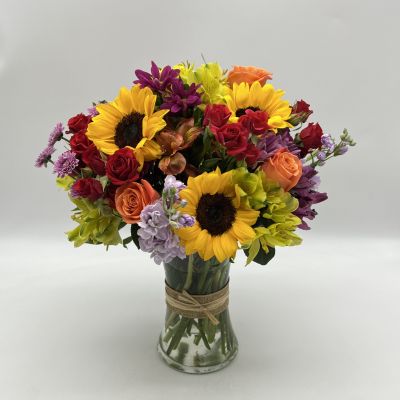 Celebrate someone with this dazzling bouquet that's certain to put a smile on anyone's face.
<ul>
 	<li>Our florists hand-design each arrangement, so colors, varieties and container may vary due to local availability</li>
</ul>