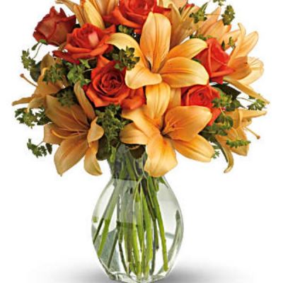 <div id="mark-3" class="m-pdp-tabs-marketing-description">Ignite their heart with this inspirational gift of warm orange roses and lilies. As wondrous as a summer sunset - but quite a bit more fragrant! - it's a versatile choice for men and women alike.</div>
<div id="desc-3">
<ul>
 	<li>Dark orange roses and asiatic lilies are mixed with fresh green bupleurum and variegated pittosporum.</li>
 	<li>Our florists hand-design each arrangement, so colors, varieties and containers may vary due to local availability</li>
</ul>
</div>