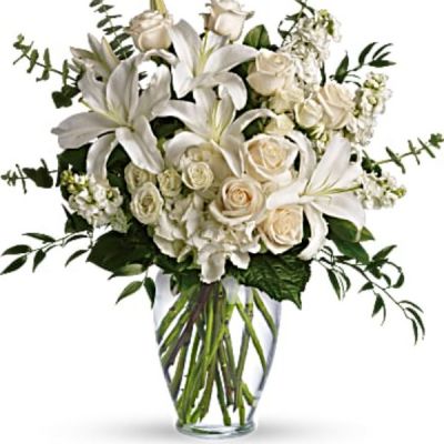 <div id="mark-3" class="m-pdp-tabs-marketing-description">A dreamy bouquet of white sympathy flowers is a comforting reminder of your love. The lush arrangement of soft colors is delivered in a majestic, tall glass vase.</div>
<div id="desc-3">
<ul>
 	<li>This gorgeous bouquet overflows with white hydrangea, crème roses, white spray roses, white oriental lilies, white stock, spiral eucalyptus, salal and Italian ruscus in a classic glass vase.</li>
 	<li>Our florists hand-design each arrangement, so colors, varieties and containers may vary due to local availability</li>
</ul>
</div>