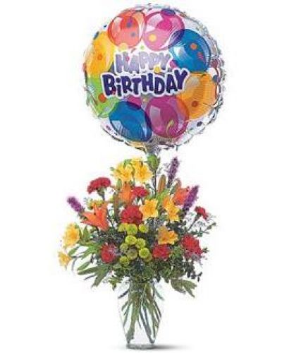 Take their birthday to brand new heights with this colorful arrangement of flowers and a high-flying birthday balloon.
Alstroemeria, carnations, chrysanthemums and lilies are delivered in a clear glass vase with attached foil balloon.
<ul>
 	<li>Our florists hand-design each arrangement, so colors, varieties and containers may vary due to local availability</li>
</ul>
