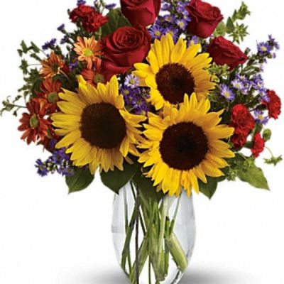 <div class="m-pdp-tabs-description">
<div id="mark-1" class="m-pdp-tabs-marketing-description">

<hr />

Pure happiness is what this pretty bouquet delivers - whether you're sending it for a fall birthday, Thanksgiving, thank you, or simply just because. Surely, no one can be in the presence of something so inherently happy and not smile.

</div>
</div>
Sunny sunflowers, red roses and miniature carnations, bronze daisy spray chrysanthemums, large lavender monte cassino asters and autumn greens are beautifully arranged in a clear glass vase.
<ul>
 	<li>Our florists hand-design each arrangement, so colors, varieties and containers may vary due to local availability</li>
</ul>