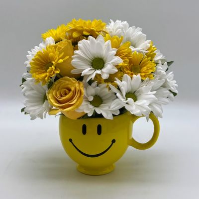 Whatever the occasion may be, send them this little bundle of floral happiness and let them know that you're thinking of them,wishing them happiness, love and joy!
<ul>
 	<li>Our florists hand-design each arrangement, so colors, varieties and containers may vary due to local availability</li>
</ul>