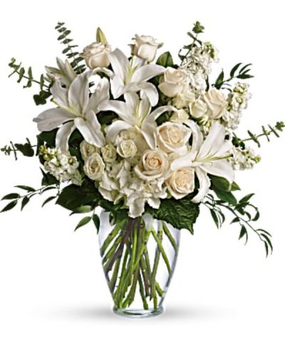 <div id="mark-3" class="m-pdp-tabs-marketing-description">A dreamy bouquet of white sympathy flowers is a comforting reminder of your love. The lush arrangement of soft colors is delivered in a majestic, tall glass vase.</div>
<div id="desc-3">
<ul>
 	<li>This gorgeous bouquet overflows with white hydrangea, crème roses, white spray roses, white oriental lilies, white stock, spiral eucalyptus, salal and Italian ruscus in a classic glass vase.</li>
 	<li>Our florists hand-design each arrangement, so colors, varieties and containers may vary due to local availability</li>
</ul>
</div>