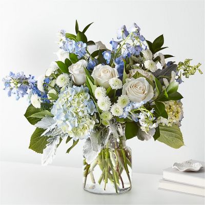 Let this uplifting arrangement be reminders of the clear skies ahead. Capturing the feeling of hope that a new day brings, this bouquet is composed of voluminous hydrangea blooms and vibrant belladonna delphinium to refresh their mood.
<ul>
 	<li>Our florists hand-design each arrangement, so colors, varieties and container may vary due to local availability</li>
 	<li></li>
</ul>