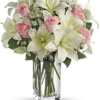<div id="mark-3" class="m-pdp-tabs-marketing-description">Stunning in its simplicity, this innocent harmony of light pink roses and snow white lilies are a heartfelt way to send your very best. The classic, clear rectangular glass vase keeps the focus on the heavenly beauty of the blooms.</div>
 
<div id="desc-3">
<ul>
 	<li>Light pink roses and white asiatic lilies form a fragrant bouquet with delicate touches of Queen Anne's lace and rich green salal.</li>
 	<li>Our florists hand-design each arrangement, so colors, varieties and containers may vary due to local availability</li>
</ul>
</div>