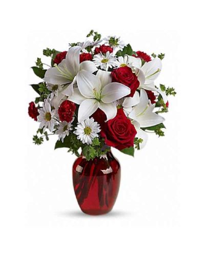 <div class="m-pdp-tabs-description">
<div id="mark-1" class="m-pdp-tabs-marketing-description">

&nbsp;

<hr />

The spirit of love and romance is beautifully captured in this enchanting bouquet. It's the perfect gift for anyone you love.

</div>
</div>
Red roses and carnations are exquisitely arranged with white asiatic lilies and chrysanthemums in a glass vase. It's lovely.
<ul>
 	<li>Our florists hand-design each arrangement, so colors, varieties and container may vary due to local availability</li>
</ul>