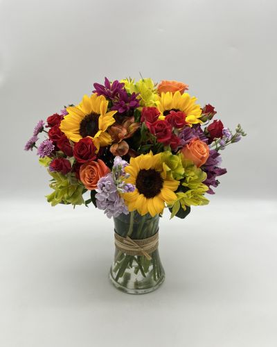 Celebrate someone with this dazzling bouquet that's certain to put a smile on anyone's face.
<ul>
 	<li>Our florists hand-design each arrangement, so colors, varieties and container may vary due to local availability</li>
</ul>