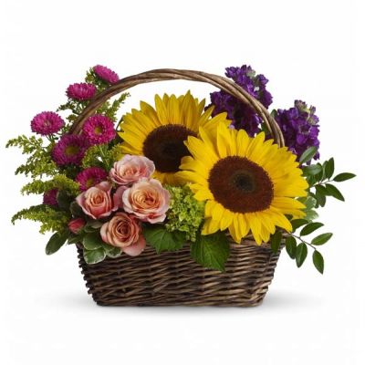 Send this colorful gift basket of flowers to your favorite garden lover or flower-loving grandmother. Like a miniature summer garden, the fresh cut flowers will brighten her kitchen counter, bedside table, coffee table...any of her favorite places!

Large yellow sunflowers, peach roses, purple stock, miniature green hydrangea, and hot pink matsumoto asters are presented in a rectangular handled basket.
Greens include solidago, huckleberry and variegated pittosporum.
<ul>
 	<li>Our florists hand-design each arrangement, so colors, varieties and containers may vary due to local availability</li>
</ul>