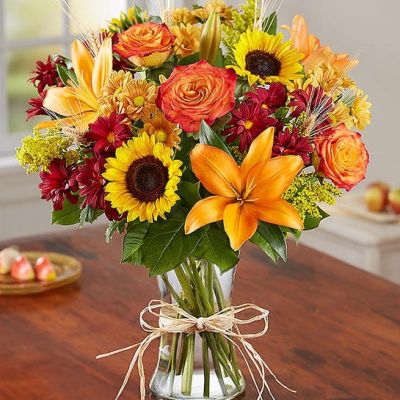 This wonderful autumn bouquet is gathered with fresh-picked flowers, revealing the rustic beauty of nature.

Shades of golden yellow, rich red and pops of orange create a timeless gift for someone special to enjoy.
<ul>
 	<li>Our florists hand-design each arrangement, so colors, varieties and containers may vary due to local availability</li>
</ul>