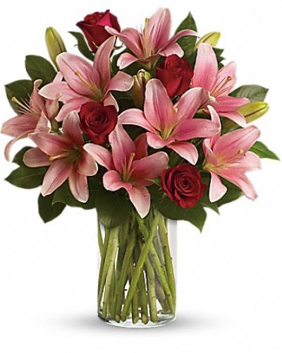 <div class="m-pdp-tabs-description">
<div id="mark-1" class="m-pdp-tabs-marketing-description">Turn an ordinary day into an enchanting daydream by sending her this magical bouquet! This stunning bouquet of rich red roses and magnificent pink lilies pampers her senses, refreshes her spirit and shows her how much you really care.</div>
</div>
Includes red roses, pink lilies and fresh lemon leaves.
<ul>
 	<li>Our florists hand-design each arrangement, so colors, varieties and container may vary due to local availability</li>
</ul>