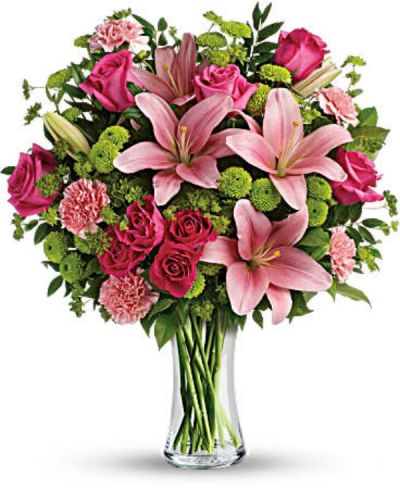 <div id="mark-1" class="m-pdp-tabs-marketing-description">What's better than pink? More pink! Show someone you care with this blissful bouquet of roses and lilies, hand-delivered in a classic glass vase. It's an impressive gift that promises to put some pink in her cheeks!</div>
<div id="desc-1">
<ul>
 	<li>This fabulously feminine bouquet features hot pink roses, hot pink spray roses, pink asiatic lilies, pink carnations, green button spray chrysanthemums, bupleurum, huckleberry and lemon leaf.</li>
 	<li>Delivered in a clear glass vase.</li>
 	<li>Our florists hand-design each arrangement, so colors, varieties and containers may vary due to local availability</li>
</ul>
</div>