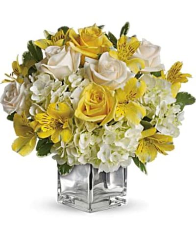 <div id="mark-3" class="m-pdp-tabs-marketing-description">Even if she's already in a great mood, this cheerfully charming bouquet will boost her spirits to the sky. Yellow roses, crème roses and other favorites in a sleek silver cube vase - irresistible!</div>
<div id="desc-3">
<ul>
 	<li>The bright bouquet includes white hydrangea, light yellow roses, crème roses and yellow alstroemeria accented with fresh greenery.</li>
 	<li>Our florists hand-design each arrangement, so colors, varieties and containers may vary due to local availability</li>
</ul>
</div>