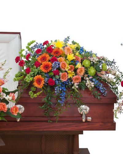 The Treasured Memories trio includes a casket spray, standing easel spray and crescent urn arrangement.
<ul>
 	<li>Our florists hand-design each arrangement, so colors, varieties and containers may vary due to local availability</li>
</ul>