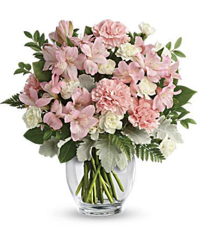 In the prettiest shade of whisper-soft pink, this breathtaking bouquet proclaims your affection in a most powerful way!
This delicate arrangement includes pink alstroemeria, pink carnations, white miniature carnations, dusty miller, huckleberry, leatherleaf fern, and lemon leaf.
<ul>
 	<li>Our florists hand-design each arrangement, so colors, varieties and containers may vary due to local availability</li>
</ul>