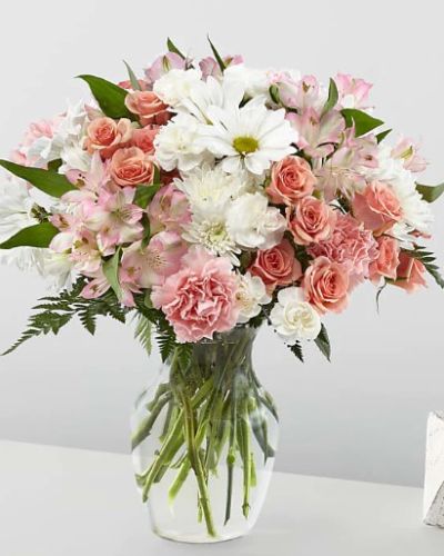 It's just, a little blush! Whoever you're sending this bouquet to, your loved ones are sure to crush hard on these gorgeous pink and white shades.
<ul>
 	<li>Our florists hand-design each arrangement, so colors, varieties and container may vary due to local availability</li>
</ul>
&nbsp;

&nbsp;