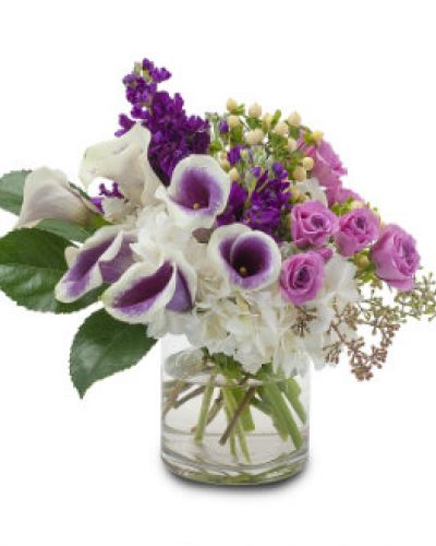 Pure joy. Best wishes. Send them both with this radiant bouquet featuring purple stock, spray roses and calla lilies.
<ul>
 	<li>Our florists hand-design each arrangement, so colors, varieties and containers may vary due to local availability</li>
</ul>