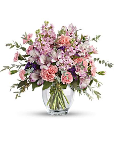 <div class="m-pdp-tabs-description">
<div id="mark-3" class="m-pdp-tabs-marketing-description">Oh so soft and divinely delicate, this perfect pastel bouquet is pretty as can be. Delivered in a classic ginger jar, the graceful arrangement at the premium level includes roses, alstroemeria, carnations and stock is a welcome surprise on any occasion.</div>
</div>
This pretty arrangement includes crème roses, lavender alstroemeria, pink carnations, miniature pink carnations, pink stock, purple sinuata statice, parvifolia eucalyptus, and seeded eucalyptus.
<ul>
 	<li>Our florists hand-design each arrangement, so colors, varieties and containers may vary due to local availability</li>
</ul>
