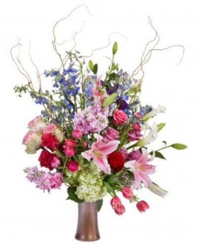 A pinnacle of class with a touch of sass, the Wondrous Beauty Arrangement is sure to wow and woo.
<ul>
 	<li>Our florists hand-design each arrangement, so colors, varieties and containers may vary due to local availability</li>
</ul>