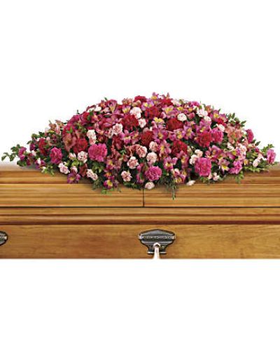 <div id="mark-1" class="m-pdp-tabs-marketing-description">

<hr />

A magnificent cascade of pink floral favorites accented with huckleberry conveys an outpouring of love and respect for one who has passed.

</div>
<div id="desc-1">
<ul>
 	<li>The sumptuous bouquet includes dark pink alstroemeria, hot pink carnations, pink carnations and miniature light pink carnations accented with huckleberry and eucalyptus.</li>
 	<li>Our florists hand-design each arrangement, so colors, varieties and containers may vary due to local availability</li>
</ul>
</div>
