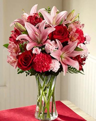 Bring the love and beauty of flowers straight to your special recipient's door. The Forever and a Day Bouquet brings together an impressive array of blushing pink and red blooms creating an unforgettable rush of romance.
<ul>
 	<li>Our florists hand-design each arrangement, so colors, varieties and containers may vary due to local availability</li>
</ul>