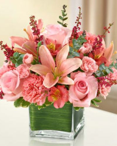 Let the vibrant beauty of our graceful all-pink bouquet convey your deepest love.

Help heal with this cube vase arrangement of pink roses, lilies, alstroemeria, carnations and heather.
<ul>
 	<li>Our florists hand-design each arrangement, so colors, varieties and containers may vary due to local availability</li>
</ul>