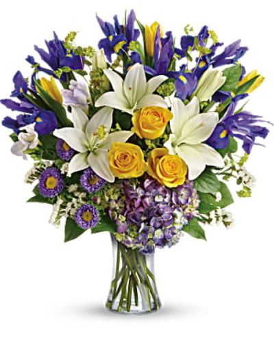 <div id="mark-3" class="m-pdp-tabs-marketing-description">Inspired by the sky on a bright spring day, this glorious bouquet of luxurious purple, yellow, white and blue blooms is a breath of fresh air! The grand gift is gathered in a graceful glass vase.</div>
&nbsp;
<div id="desc-3">
<ul>
 	<li>Purple hydrangea, yellow roses, yellow tulips, white asiatic lilies, blue iris, lavender freesia, and lavender matsumoto asters are arranged with white sinuata statice, bupleurum, and lemon leaf.</li>
 	<li>Our florists hand-design each arrangement, so colors, varieties and containers may vary due to local availability</li>
</ul>
</div>