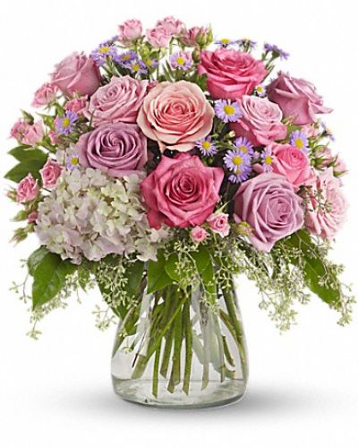 <div class="m-pdp-tabs-description">
<div id="mark-1" class="m-pdp-tabs-marketing-description">This softly elegant gesture of gentle colors that is perfect for any occasion.</div>
</div>
Lavender and pink flowers such as roses, hydrangea, monte cassino asters, eucalyptus and salal are arranged in a clear glass vase.
<ul>
 	<li>Our florists hand-design each arrangement, so colors, varieties and container may vary due to local availability</li>
</ul>