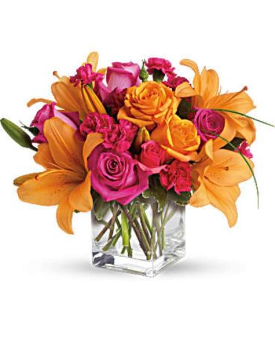 <div id="mark-3" class="m-pdp-tabs-marketing-description">Tres chic! Send that special someone a stylish sentiment with the bright colors of this modern arrangement. Summery hot pinks and oranges are contrasted by the cool clarity of a simple cube vase. An eye-catching everyday choice!</div>
<div id="desc-3">
<ul>
 	<li>Orange asiatic lilies, hot pink and light orange roses, miniature red carnations and a bit of understated greenery.</li>
 	<li>Our florists hand-design each arrangement, so colors, varieties and containers may vary due to local availability</li>
</ul>
</div>