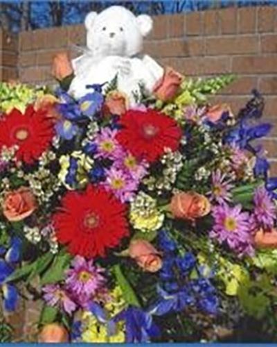 A touching tribute for someone special.
<ul>
 	<li>Our florists hand-design each arrangement, so colors, varieties and containers may vary due to local availability</li>
</ul>
&nbsp;