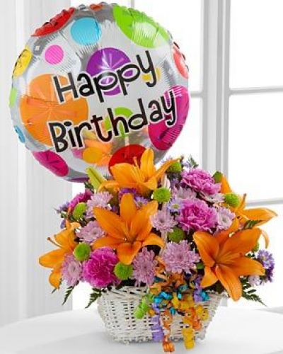Happy Blooms Basket will make any birthday special.
<ul>
<li>Our florists hand-design each arrangement, so colors, varieties and containers may vary due to local availability</li>
</ul>