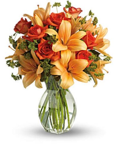 <div id="mark-3" class="m-pdp-tabs-marketing-description">Ignite their heart with this inspirational gift of warm orange roses and lilies. As wondrous as a summer sunset - but quite a bit more fragrant! - it's a versatile choice for men and women alike.</div>
<div id="desc-3">
<ul>
 	<li>Dark orange roses and asiatic lilies are mixed with fresh green bupleurum and variegated pittosporum.</li>
 	<li>Our florists hand-design each arrangement, so colors, varieties and containers may vary due to local availability</li>
</ul>
</div>
