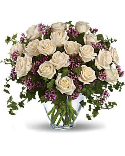 <div id="mark-1" class="m-pdp-tabs-marketing-description">Send an English garden someone's way with this gorgeous arrangement. Tendrils of green ivy trail delicately from a beautiful bunch of creamy roses and purple waxflower for a bouquet that's both traditional and unexpected.</div>
<div id="desc-1">
<ul>
 	<li>Our florists hand-design each arrangement, so colors, varieties and containers may vary due to local availability</li>
</ul>
</div>