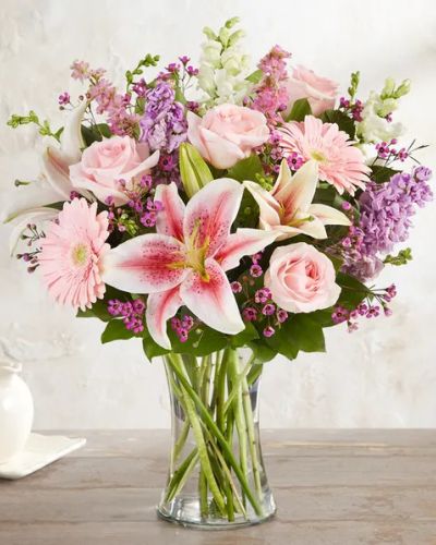 When it comes to letting her know she’s always on your mind, think pink and lavender. We’ve hand-gathered a romantic mix of pink and purple blooms to create a gorgeous, garden-inspired bouquet. Designed by expert florist Breanna Cartwright of Modesto, CA, this beautiful bunch will remain a fond memory for a long time.
<ul>
 	<li>Our florists hand-design each arrangement, so colors, varieties and container may vary due to local availability</li>
</ul>
&nbsp;
