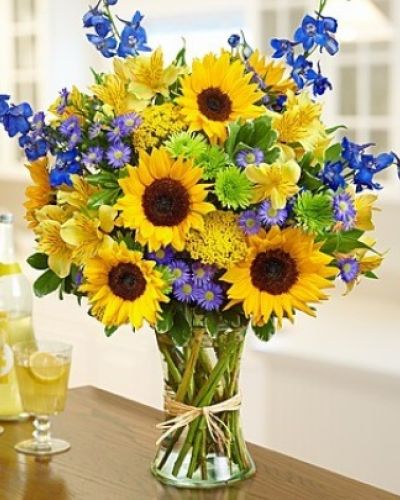 <div class="summary entry-summary">
<div class="woocommerce-product-details__short-description">

Send some sunshine with this bouquet full of fresh sunflowers, delphinium, alstroemeria, yarrow, monte casino and more!
<ul>
 	<li>Our florists hand-design each arrangement, so colors, varieties and containers may vary due to local availability</li>
</ul>
</div>
</div>