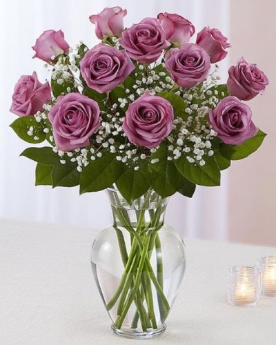 **Picture for example purposes only. Please select rose count you wish to purchase.
Surprise your special one with this gorgeous arrangement of lavender roses available in three roses to three dozen wonderful blooms.
It’s an unforgettable display of your timeless love that they'll always remember.
<ul>
<li>Our florists hand-design each arrangement, so colors, varieties and containers may vary due to local availability</li>
</ul>