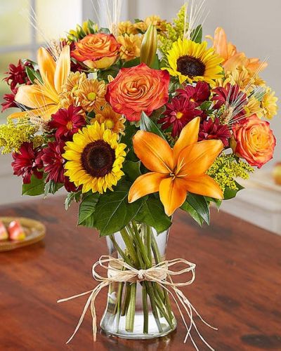 This wonderful autumn bouquet is gathered with fresh-picked flowers, revealing the rustic beauty of nature.
Shades of golden yellow, rich red and pops of orange create a timeless gift for someone special to enjoy.
<ul>
<li>Our florists hand-design each arrangement, so colors, varieties and containers may vary due to local availability</li>
</ul>