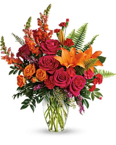 <div class="m-pdp-tabs-description">
<div id="mark-2" class="m-pdp-tabs-marketing-description">The bright stuff for punching up anyone's mood! Bring happiness to any day with this bold, sunset-inspired blend of hot pink roses and orange lilies in a classic glass vase!</div>
</div>
Hot pink roses, orange spray roses, orange asiatic lilies, hot pink carnations, red miniature carnations, orange snapdragons, and pink heather are accented with sword fern, huckleberry, seeded eucalyptus, and lemon leaf. Delivered in a clear glass vase.
<ul>
<li>Our florists hand-design each arrangement, so colors, varieties and containers may vary due to local availability</li>
</ul>