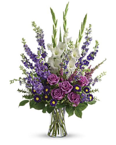 <div class="m-pdp-tabs-description">
<div id="mark-1" class="m-pdp-tabs-marketing-description">Lavender and white flowers make a grand statement in this bouquet. Cherish your memories with this display of lavender larkspur and roses, deep purple asters, pure white gladioli and the softest pink heather.
<ul>
 	<li>Our florists hand-design each arrangement, so colors, varieties and container may vary due to local availability</li>
</ul>
</div>
</div>