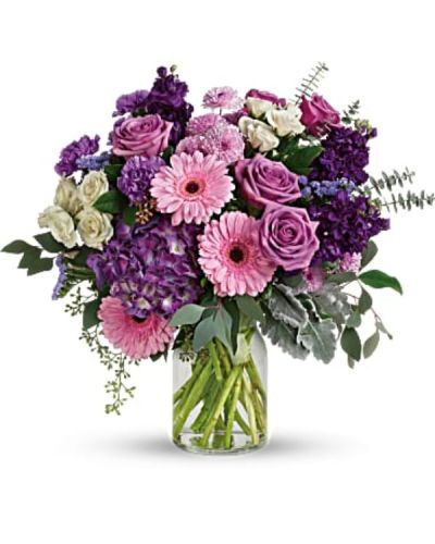 <div id="mark-3" class="m-pdp-tabs-marketing-description">Bring beauty to any occasion with the deep purples and playful pinks of this breathtaking bouquet.</div>
<div id="desc-3">
<ul>
 	<li>This magnificent bouquet features purple hydrangea, lavender roses, crème spray roses, pink gerberas, lavender carnations, purple stock, lavender cushion spray chrysanthemums, lavender sinuata statice, dusty miller, spiral eucalyptus, seeded eucalyptus, silver dollar eucalyptus, and lemon leaf.</li>
 	<li>Our florists hand-design each arrangement, so colors, varieties and containers may vary due to local availability</li>
</ul>
</div>