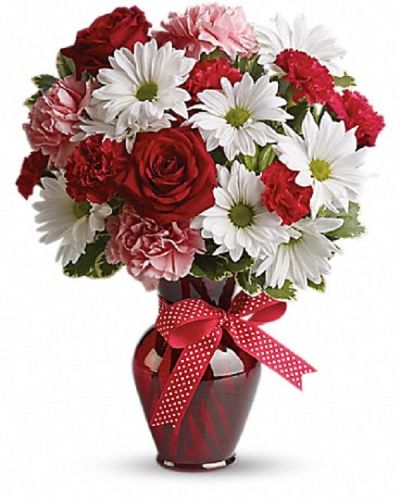 <div class="m-pdp-tabs-description">
<div id="mark-1" class="m-pdp-tabs-marketing-description">Delight your love with this beautiful bouquet of bright white chrysanthemums, precious pink carnations, romantic red roses and more in a radiant red vase.</div>
</div>
The charming bouquet includes white daisy spray chrysanthemums, pink carnations, red miniature carnations and red roses accented with fresh greenery.
<ul>
 	<li>Our florists hand-design each arrangement, so colors, varieties and container may vary due to local availability</li>
</ul>