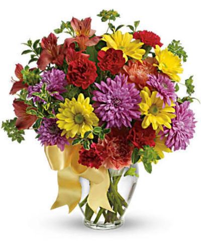 <div id="mark-1" class="m-pdp-tabs-marketing-description">She is yours, and you are hers. Remind her of that simple fact with this simply sweet mix of colorful flowers that are sure to warm her heart.</div>
<div id="desc-1">
<ul>
 	<li>Red alstroemeria, orange carnations, miniature red carnations, yellow daisies and lavender chrysanthemums are arranged with bupleurum and oregonia - with a pretty yellow ribbon tied around the vase for that extra-special touch.</li>
 	<li>Our florists hand-design each arrangement, so colors, varieties and containers may vary due to local availability</li>
</ul>
</div>