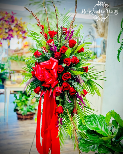 Fresh Standing Spray with red roses and gladiolus and lush greenery
<ul>
 	<li>Our florists hand-design each arrangement, so colors, varieties may vary due to local availability</li>
</ul>
&nbsp;
