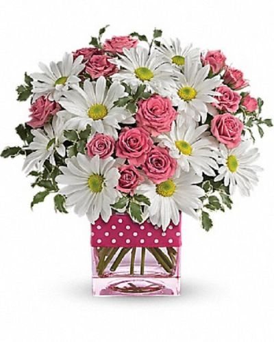 <div class="m-pdp-tabs-description">
<div id="mark-1" class="m-pdp-tabs-marketing-description">Polka dots and posies, they're the perfect pair. Well, at least in this pretty arrangement they are. Just the right flowers in just the right vase all wrapped up in… you guessed it, just the right ribbon.</div>
</div>
Pink spray roses and white daisy spray chrysanthemums are delivered in an exclusive pink vase that's wrapped with a polka-dot satin ribbon
<ul>
 	<li>Our florists hand-design each arrangement, so colors, varieties and container may vary due to local availability</li>
</ul>