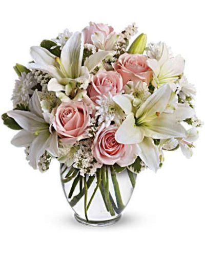 <div id="mark-3" class="m-pdp-tabs-marketing-description">Express your love with the eloquence of Shakespeare - without saying a word. She'll adore this exquisite bouquet of roses and lilies and other pastel favorites in a classic ginger vase. And she'll know just the words to let you know.</div>
Light pink roses, white asiatic lilies, white alstroemeria and white cushion spray chrysanthemums are mixed with white statice and variegated pittosporum in a clear, rounded vase.
<ul>
<li>Our florists hand-design each arrangement, so colors, varieties and containers may vary due to local availability</li>
</ul>