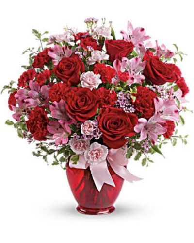 <div id="mark-3" class="m-pdp-tabs-marketing-description">Love is bliss! Celebrate your special connection with this romantic bouquet of red roses mixed with flirty pink blooms. Arranged in a red jar and tied up with a bow, it's a loving way to make her feel extra special, on Valentine's Day or any day of the year!</div>
<div id="desc-3">
<ul>
<li>Lush red roses, pink alstroemeria, red carnations, miniature red carnations, miniature pink carnations and pink waxflower are arranged with pitta negra and lemon leaf.</li>
<li>Our florists hand-design each arrangement, so colors, varieties and container may vary due to local availability</li>
</ul>
</div>