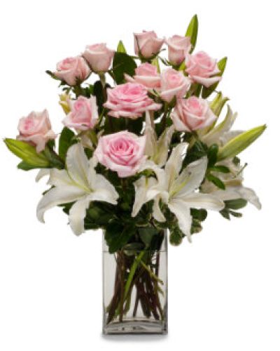 Send hugs and kisses with this gorgeous arrangement of white lilies and pink roses.
<ul>
 	<li>Our florists hand-design each arrangement, so colors, varieties and containers may vary due to local availability</li>
</ul>